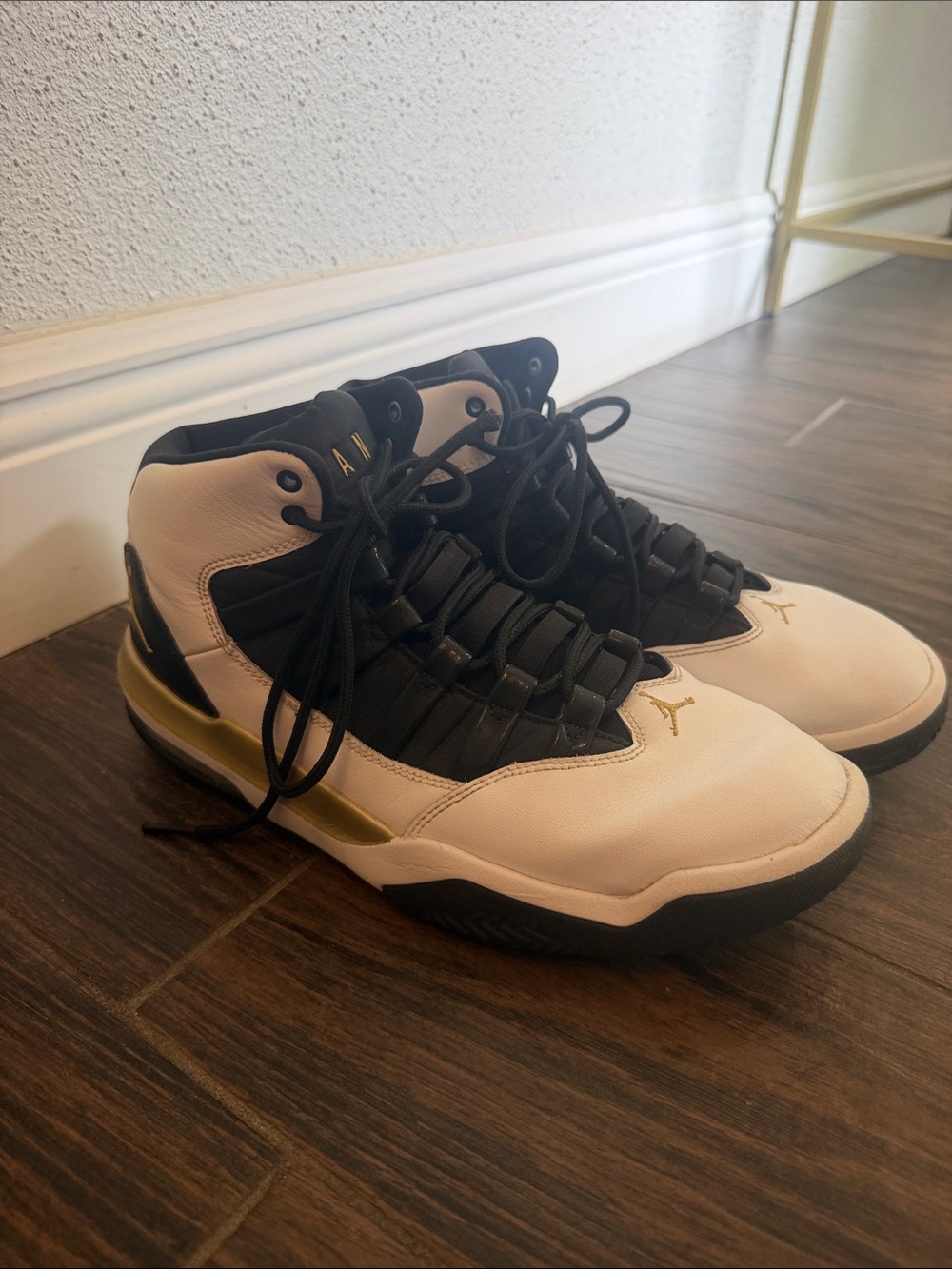 Men's air Jordan max aura in White and Black with Gold Accents